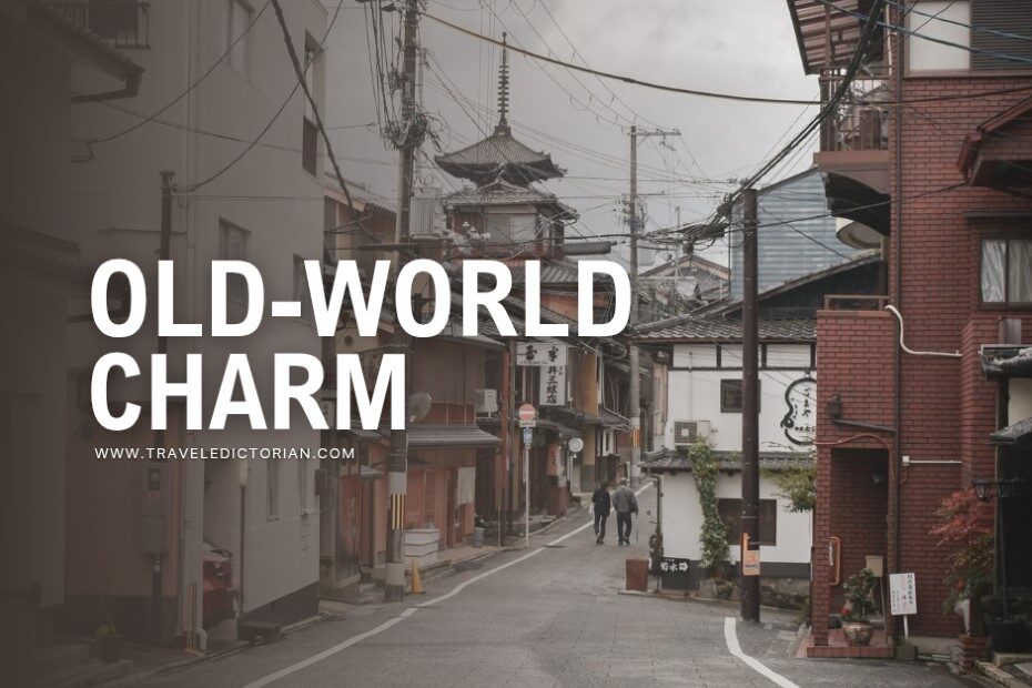 Rustic houses and a temple alongside a street