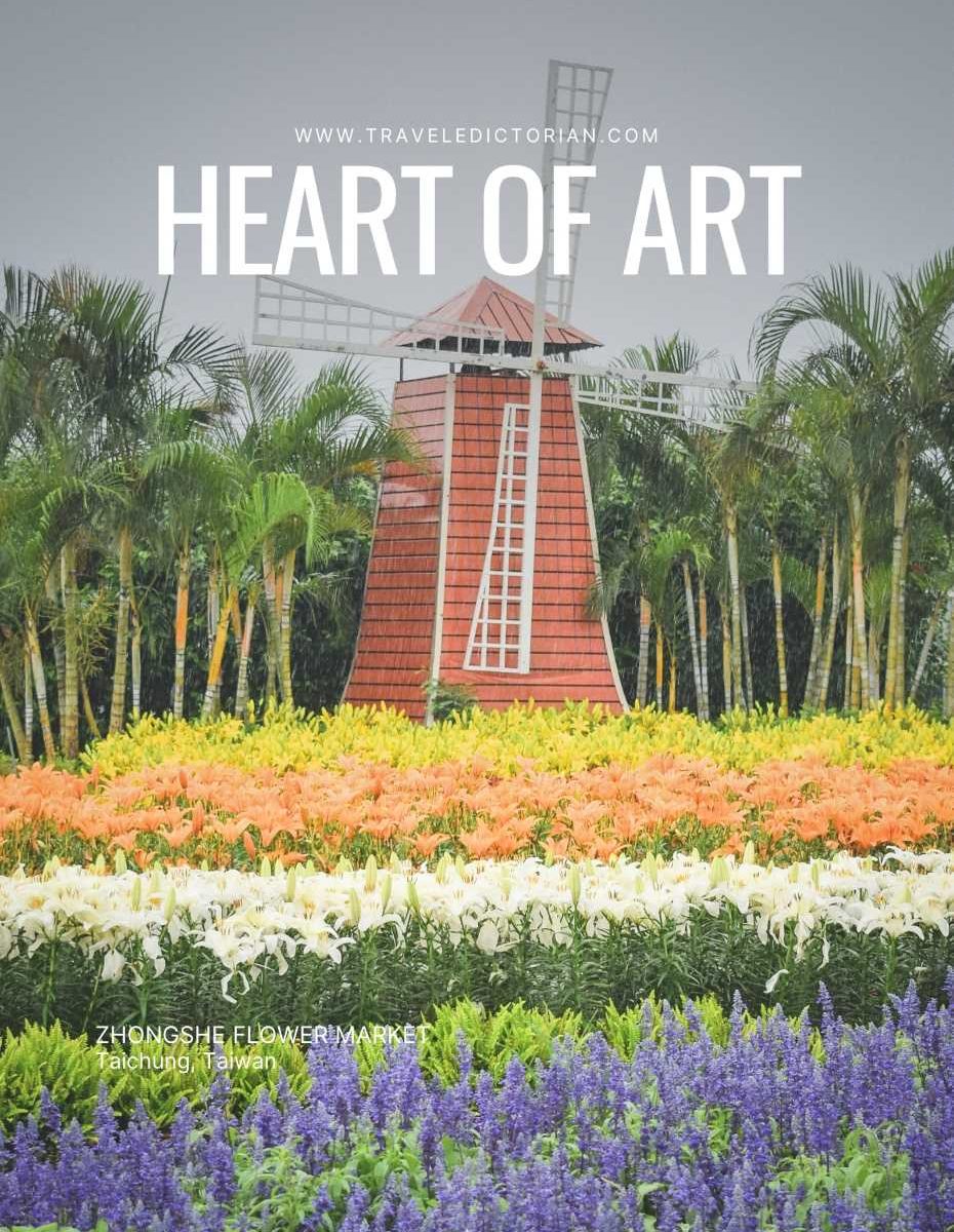taichung-travel-guide A windmill in a well-manicured flower garden